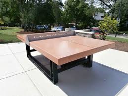 The dimensions of the ping pong table are five feet wide, nine feet long and thirty inches high. Concrete Ping Pong Table T1086035 Terra Cotta Color Top Lr Doty Concrete