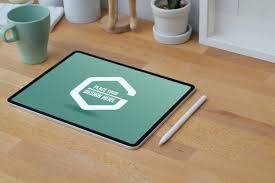 This is an excellent free mockup for creating a simple, elegant responsive web design showcase mockup. Mockup Tablet On Wooden Table Graphic By Bongkarngraphic Creative Fabrica