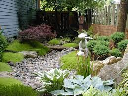 Build A Dry Stream Bed Mother Nature Would Be Proud Of Backyard Drainage Drainage Solutions Dry Creek Bed