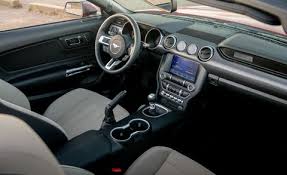 The battery is under the vehicle, leaving the space under the hood for storage (front trunk, or frunk). 2020 Ford Mustang Review Pricing And Specs