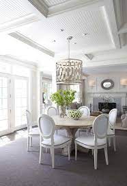 The molding creates an elegant pattern that encircles the middle part of the ceiling, which has been painted in a color that matches the dining room chairs. Project Hodge Podge Coffered Ceiling Ideas And Inspiration Coffered Ceiling Dining Room Dining Room Ceiling Transitional Dining Room