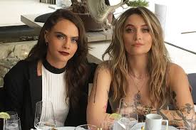 Giggling cara delevingne has a fun time during puma modelling shoot. Cara Delevingne And Paris Jackson Cozy Up At Glam Oscars Bash