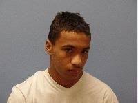 Additional charge filed against man who allegedly spit at corrections  officer