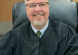 Judge John simcoe of Hardin county Kentucky has allowed my family's land to  be sold to are neighbor and has allowed sever mental anguish and the  destruction of our property and personal