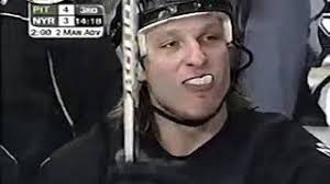 Darius Kasparaitis absolutely destroys Radek Dvorak, then draws two minor  penalties all in one play (against NYR in 2001)