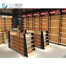 produce display wooden gondolas supermarket design wooden book rack stationery shop furniture grocery shopping buy supermarkt regale gondola supermarket shelf in 2021 store shelves design retail store interior design grocery store design