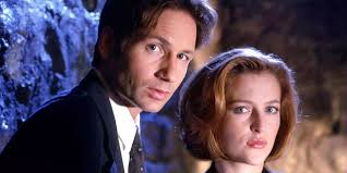 Not a versus but crossover. Mulder and Scully are sent to Kansas Smallville  to investigate strange events recently, during the investigation they come  across the Kent family and are intrigued by the