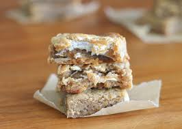 Line the cake pan with parchment paper and coat the parchment with the baking spray. Fluffernutter Bars