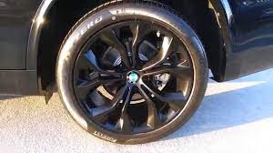 Rocker panel extensions and black wheel well trim. New Bmw X5 35i Sdrive Black 20 Wheels Walk Around Car Review Youtube