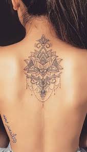 Womens Small Mandala Back Tattoo In 2020 Henna Tattoo Back Spine Tattoos For Women Chandelier Tattoo