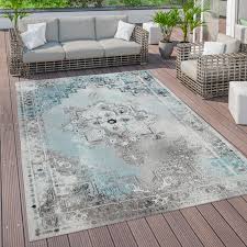 Le dais protège la terrasse contre la pluie. Outdoor Teppich Terrasse Balkon Vintage Kuchenteppich Orient Muster Turkis Grau Kaufen Bei Diva Teppich Center