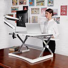 The top of the monitor's screen should be positioned slightly lower than your resting eye height. Elevate Height Adjustable Desktop Stand White Fast Office Furniture