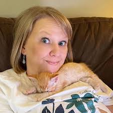 The face behind the voice. I know many of you don't know me other than the  crazy cat lady you hear in our videos. This is me (and Butterfly)! I have  been