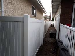 Before you build a privacy fence, check with your city's zoning department. Phoenix Fence Vinyl