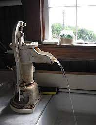 Showing results for hand pump faucet. House Tour Vintage Diy Home On Mystery Island Vintage Diy Vintage Kitchen Rustic House