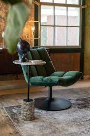 Made from solid oak wood this chair's legs are tapered and splayed with an open back and curved seat for a classic silhouette. Bar Velvet Lounge Chair By Dutchbone In Lounge Chairs