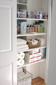 So happy to have everything organized, labeled, and neat! Bathroom Closet Organization Trendecors
