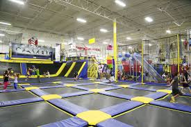 An Incredible Over 6 000 Square Foot Indoor Trampoline Park Including 3 Basketball Hoops To Dunk The Ball Trampoline Trampoline Park Basketball Games For Kids