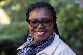 How visiting professor Elisabeth Ayuk-Etang fled war-torn Cameroon with her  family — and what happens next