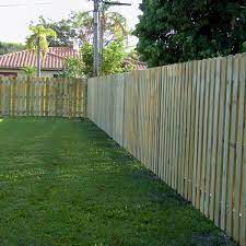 Feather edged board fencing is a good strong pressure treated fence mainly used for domestic purposes. Wood Fencing In Palm Beach County By Fencing South Florida