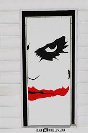 The door is based on a common classic design using a horizontal engraving creating a look of wide boards. 8 Fun Spooky And Definitely Easy Diy Halloween Door Decorating Ideas