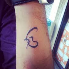 Amazing sikhism khanda with tiger tattoo design for shoulder. 70 Amazing Punjabi Tattoo Designs Body Art Guru