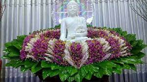 pin by paulo on buddha flower buddha flower church flower arrangements flower arrangements