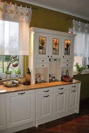 Wood cabinets are a classic feature in any kitchen. English Country Cottage Kitchen Windows Vtwctr