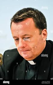 Father timothy hi-res stock photography and images