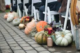 12 Ways To Decorate Your Fall Wedding With Pumpkins Pumpkin Wedding Pumpkin Centerpieces Wedding Fall Wedding Decorations