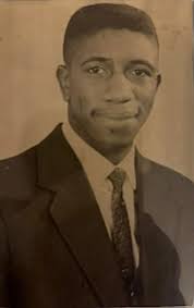 Can I remove the man in blue from this photo?