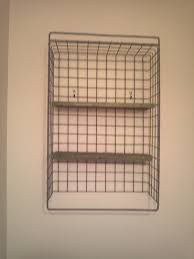 How To Hang Wire Basket On Wall Google Search Wire Wall Basket Wire Basket Shelves Baskets On Wall