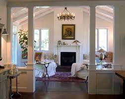Drawing the eye upward to create a sense of volume and spaciousness, vaulted ceilings add drama to otherwise ordinary rooms. Half Wall Ideas Living Room Living Room Traditional With Vaulted Ceiling Vaulted Ceiling Basement Remodeling Living Room Remodel Modern Room