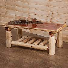 Our collection includes coffee and end tables that are made from wood or metal as well as collection of casual tables that feature wildlife images. Wildwood Rustics Red Cedar Log Coffee Table Log Cabin Rustics