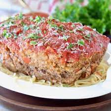 Italian Sausage And Ground Beef Are Combined With Italian Herbs Parmesan Ricotta Cheese In The Best Italia Italian Meatloaf Meatloaf Quick Meatloaf Recipes