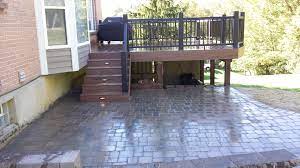 Deciding between wood decks and stone patios requires careful consideration. Pin On Our Work