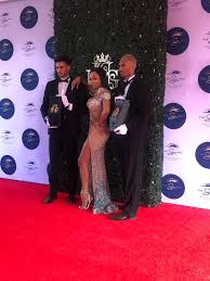 The other white dress, with a plunging neck line, paired with a belt, snatched. Bonang Matheba Hosts The Sun Met 2020 Lipstick Alley