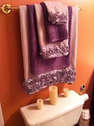 Bathroom Update Nice Grey Towels With Decorative Roses And Deep Purple Accents Simple Way T Decorative Bath Towels Bathroom Towel Decor Purple Bathroom Decor