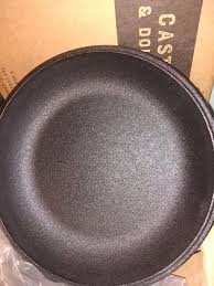 Hi, my name is emery and i am not a fan of showing my work. I Bought A Dutch Oven With A Skillet Lid From Cuisinel And It Feels Like An Emery Board Both Parts Are Very Rough Inside Is It Supposed To Be Like This