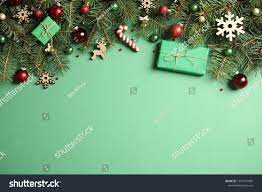 Fir Tree Branches With Christmas Decoration On Green Background Flat Lay Space For Text Ad Affiliate Chri Christmas Christmas Decorations Tree Branches