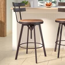 As a rule of thumb, the top of the stool's seat should be about 10. Henley Adjustable Swivel Bar Stool Laurel Foundry Farmhouse Bar Stools Swivel Bar Stools Rustic Bar Stools