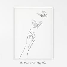 Vector illustration in vintage style. Hand And Butterflies One Line Art One Line Drawing Butterfly Etsy Butterfly Drawing Line Art Flower Art Drawing