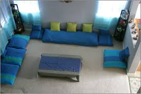 Your living room is a place for your family and friends to gather, so why not make the seating as communal as possible? Design And Decorating Ideas For Every Room In Your Home Floor Seating Living Room Design
