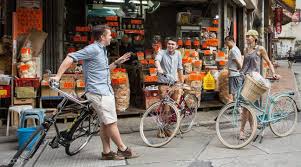 Kids learn to ride a bicycle through several phases: Hong Kong Island Bike Tour