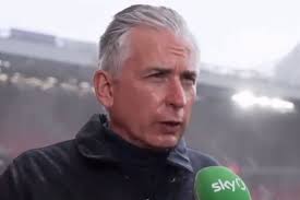 Awkward moment Sky Sports commentator Alan Smith gets soaked