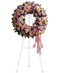 Funeral flowers are typically white or red roses, white chrysanthemums, white lilies and more pale flowers. Graceful Wreath Sympathy Flowers Funeral Flowers Flower Arrangements