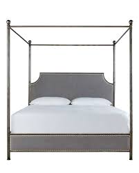 Rubberwood solids, hardwoods and white oak and pine knotty oak veneers. Taverna California King Canopy Bed