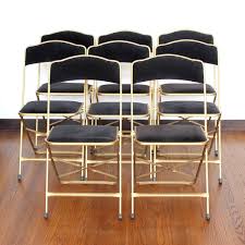 Hercules series curved triple braced & double hinged gray vinyl upholstered metal folding chair. Gold Folding Chairs Ideas On Foter