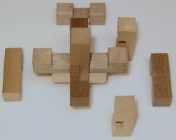 Though the pieces may seem like they'll never fit together, solving the puzzles is surprisingly easy! Miyako Wooden Puzzle Copyright J A Storer