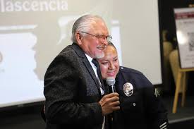 Patrol cars from Anaheim PD drive by UCI Medical Center in Orange to show  their gratitude during the coronavirus pandemic as many of them line up to  see. Photo by Steven Georges/Behind